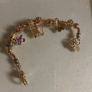 New. Butterfly & Hearts Bracelet. Gold plated. 7.5” Stretch Band & moving Charms